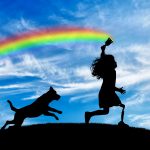 Child has a disability with a prosthetic leg with a brush in hand runs and draws a rainbow in sky with his dog