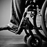 man in wheelchair at home, close up