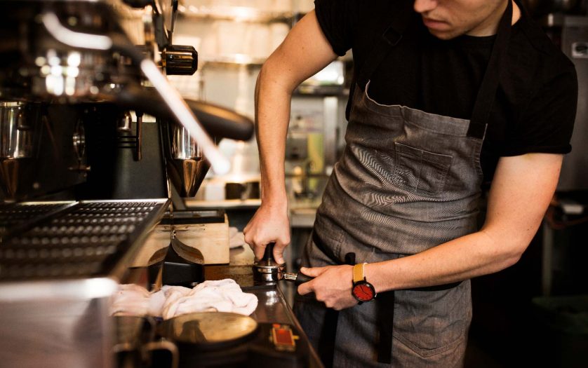 Barista working in coffee shop