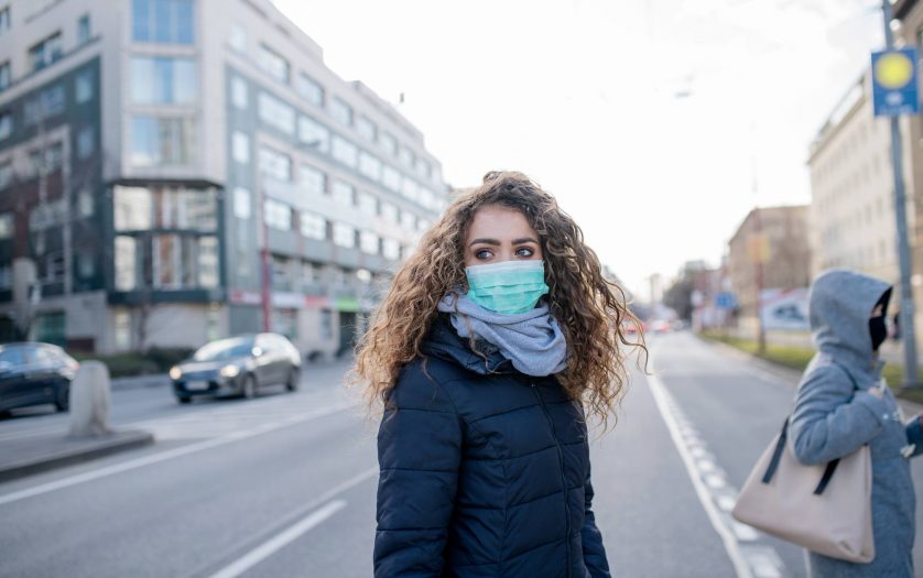 woman crossing the street
