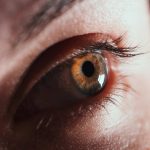 A beautiful insightful look green woman's eye. Close up