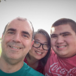 Eric Parsa, right, is seen with his mother, Donna Lou, center, and father, Daren Parsa.