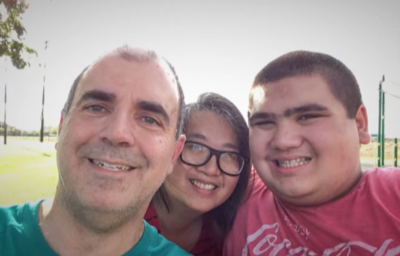 Eric Parsa, right, is seen with his mother, Donna Lou, center, and father, Daren Parsa.