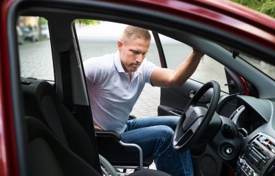 man in wheelchair boarding the car