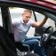 man in wheelchair boarding the car