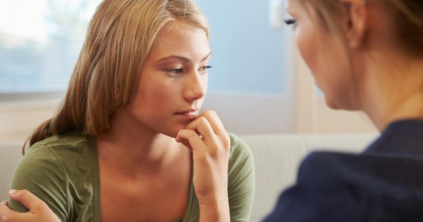 medical staff with Treating Teenage Girl