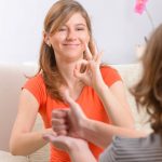 woman learning sign language