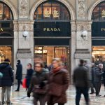 People passing by Prada shop in Galleria Vittorio Emanuele in Milan, Italy