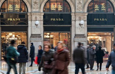 People passing by Prada shop in Galleria Vittorio Emanuele in Milan, Italy