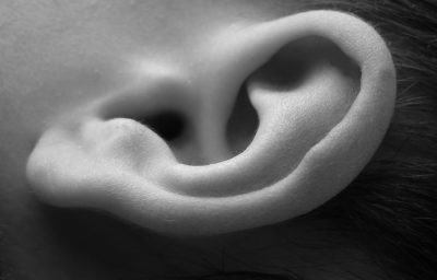 Close-up of child ear - black and white