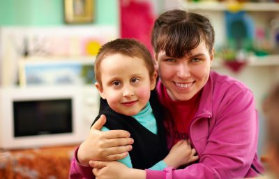 Cheerful children with disabilities in rehabilitation center