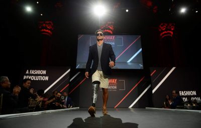 a model with disability walking at the ramp