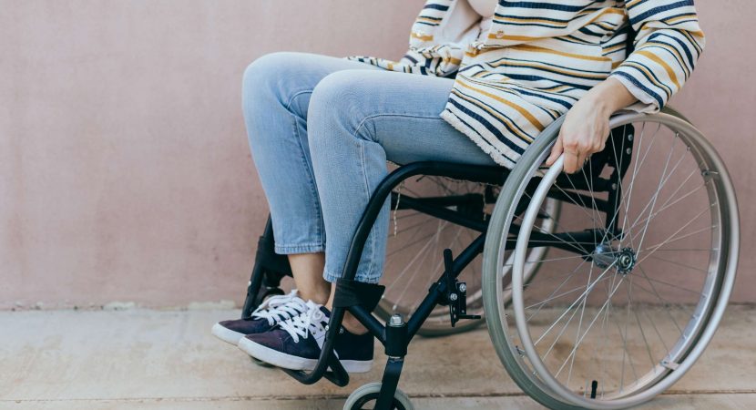 woman young woman in a wheelchair outdoors