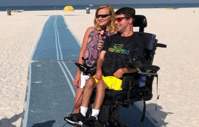 Andrew Brettner models in Surf Style clothing on the mobility mat