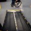 A man in a wheelchair moves to the lift of an accessible bus