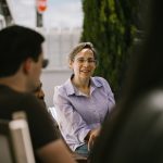 Small group of people enjoying conversation