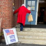 Old Woman Voter Entering Voting Polling Place for USA Government Election