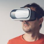 Man with virtual reality goggles.