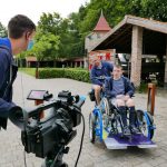 A wheelchair platform bike.