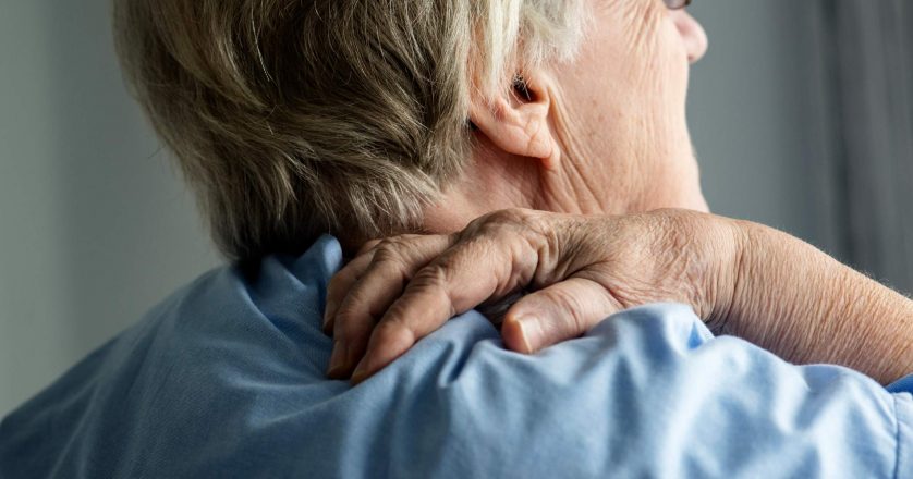 Elderly woman with back pain