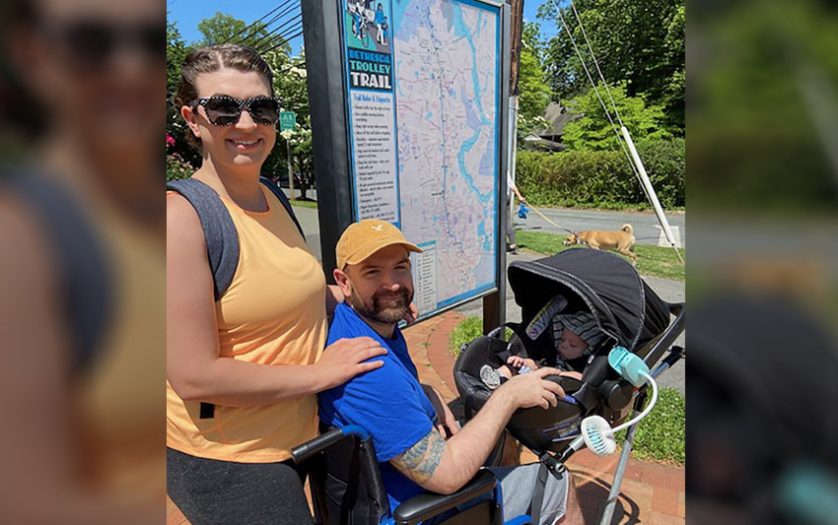 Chelsie and Jeremy King use the WheeStroll Wheelchair Stroller Attachment to take their baby Phoenix on a walk.