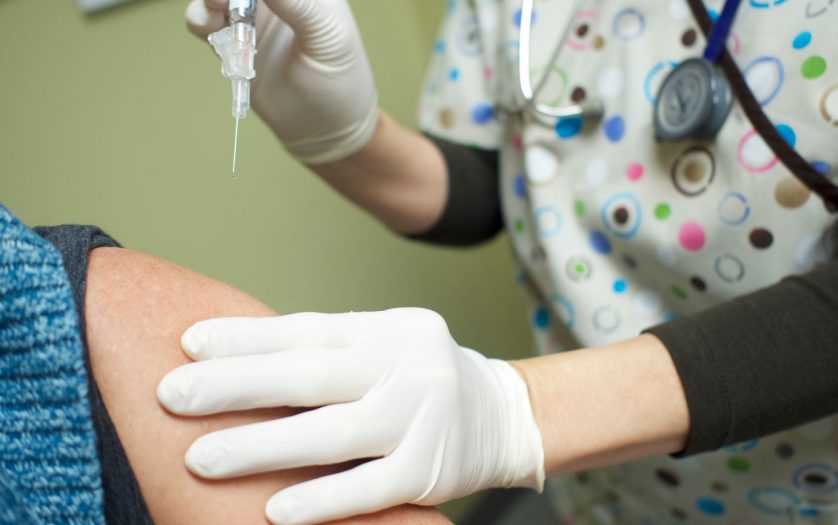 Nurse administering Covid vaccine