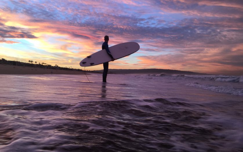 surfing at sunrise