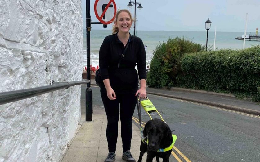 Siobhan Meade outdoor with her Guide dog