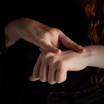 close up woman signing in sign language