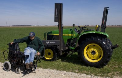 a man transferring from truck to his
