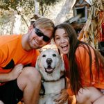 Niya Esperanza with her boyfriend, Jake Olson (left) and guide dog