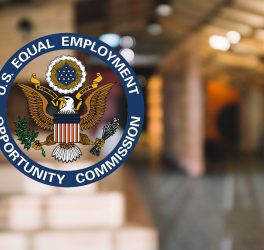 EEOC logo with blur background of office