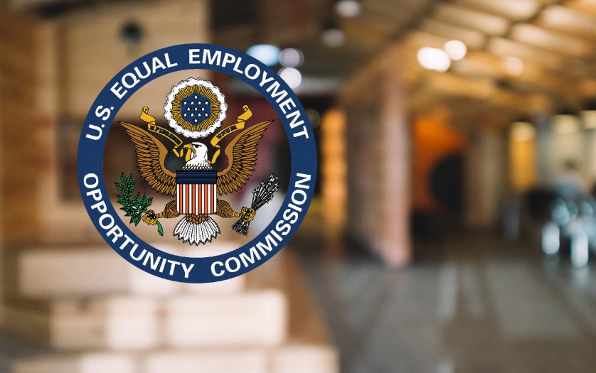 EEOC logo with blur background of office