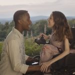a woman in wheelchair with a man