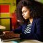 African woman using laptop