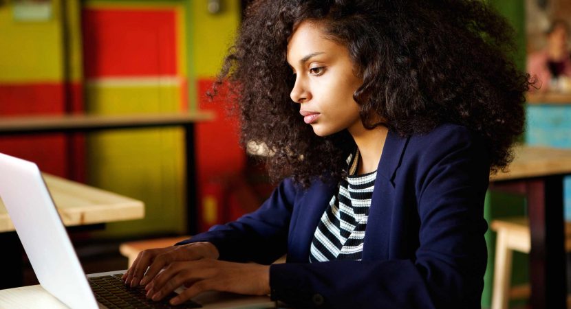 African woman using laptop
