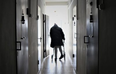 a person walking using crutches