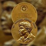 Gold award medallion with image of Barbara Jordan in profile