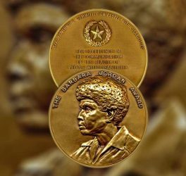 Gold award medallion with image of Barbara Jordan in profile