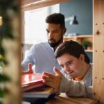 young man with down syndrome with teacher