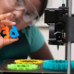 kid with 3D-printed objects
