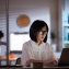woman working on laptop