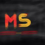 MS text on black Background