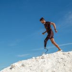 Man with prosthetic running