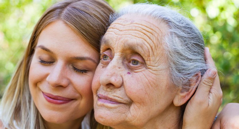 Hugging grandma in the park