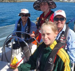 Students and instructors enjoy sailing as part of the Winds of Joy program near Mackay.