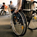 wheelchair user entering in the office