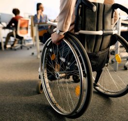 wheelchair user entering in the office