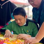 a teacher with student with a disability