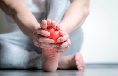 man with pain in foot
